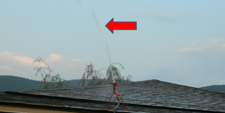 Firehawk Rooftop Sprinkler® In Action With Full On Spray